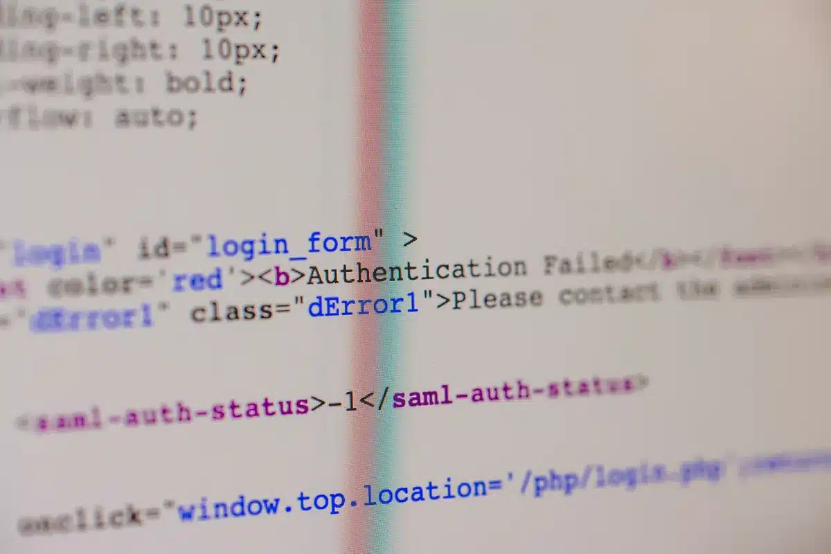 Developer working on code to fix server errors and broken links