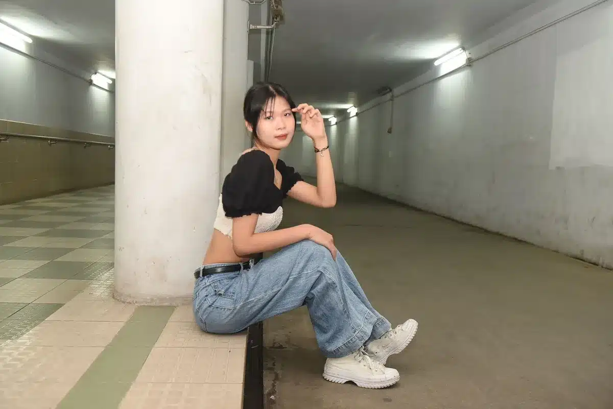 High-waisted wide-leg denim jeans displayed on a neutral background