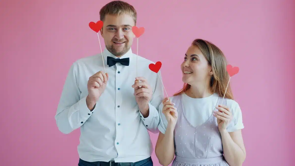 Two people sharing a lighthearted moment, evoking romantic comedy warmth