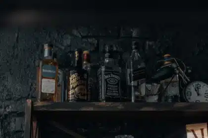 Elegantly arranged alcohol-free bar with NA spirits, beers, and cocktail ingredients on display