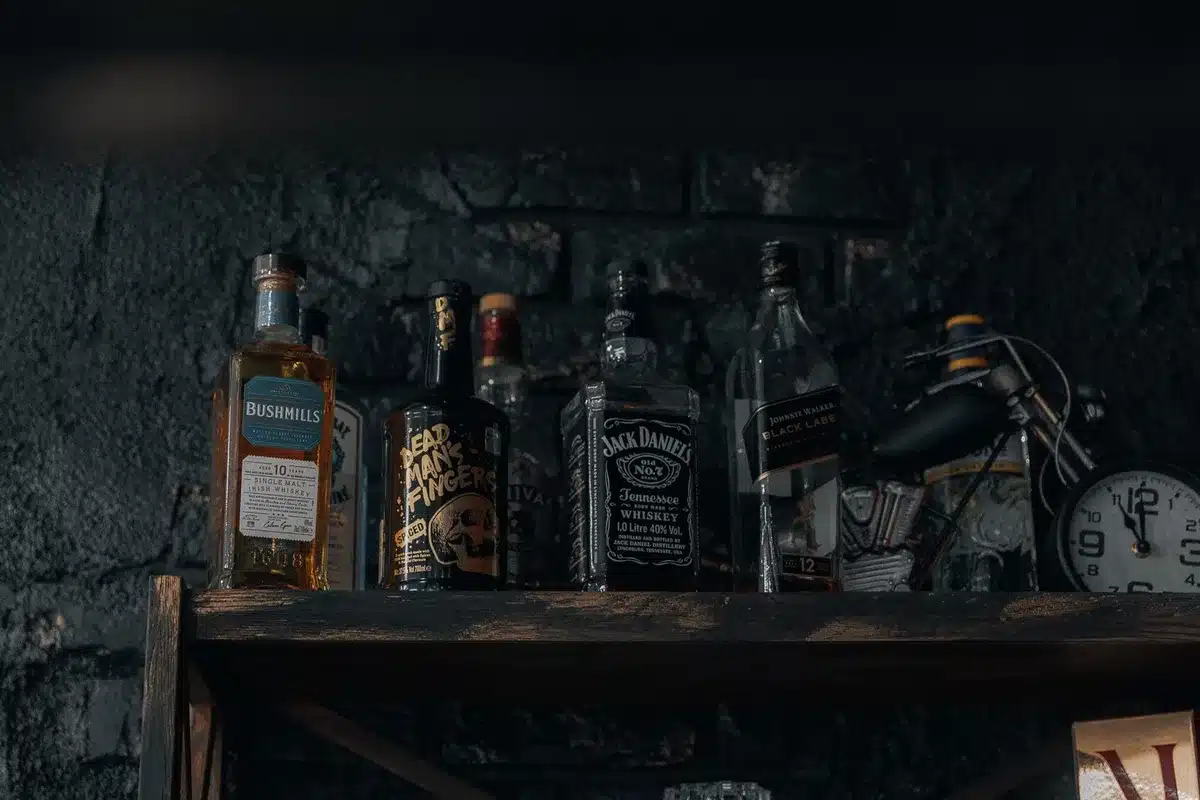 Elegantly arranged alcohol-free bar with NA spirits, beers, and cocktail ingredients on display