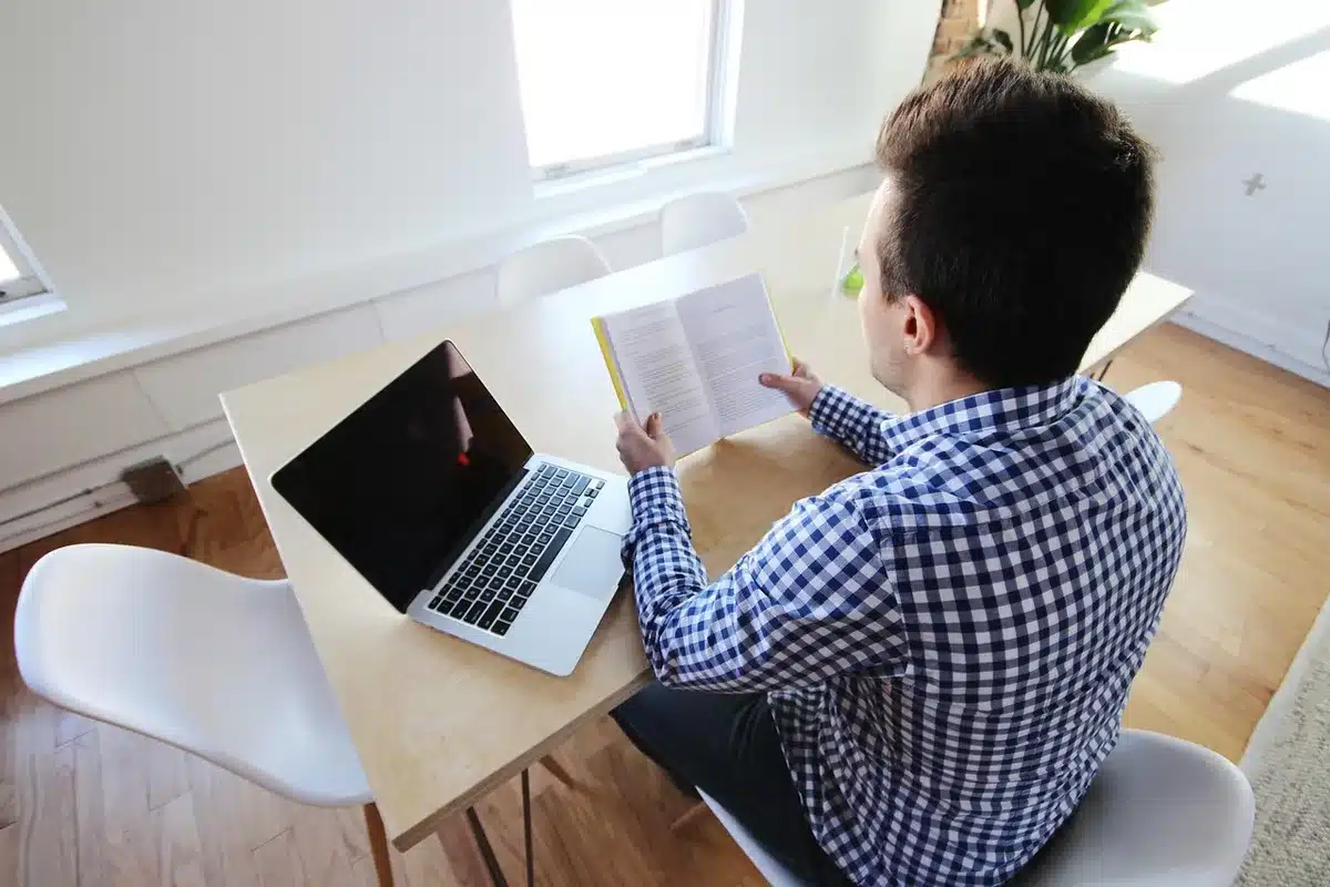 Person reading about demisexuality on a laptop, illustrating clearer on-screen representation