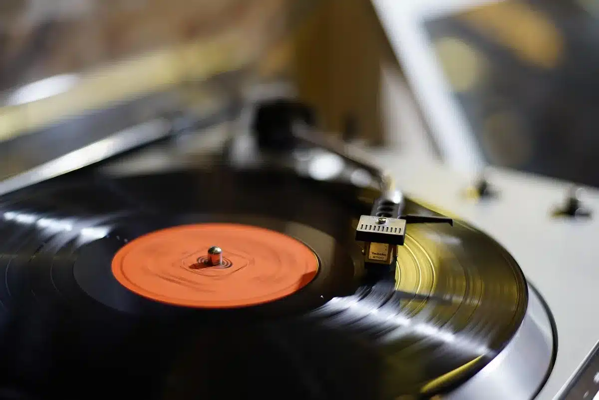 Stack of reissued vinyl records on a table awaiting release