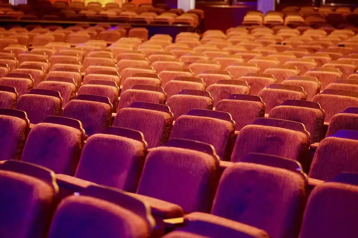 Interior view of the Ryman Auditorium stage with vintage wood and seating