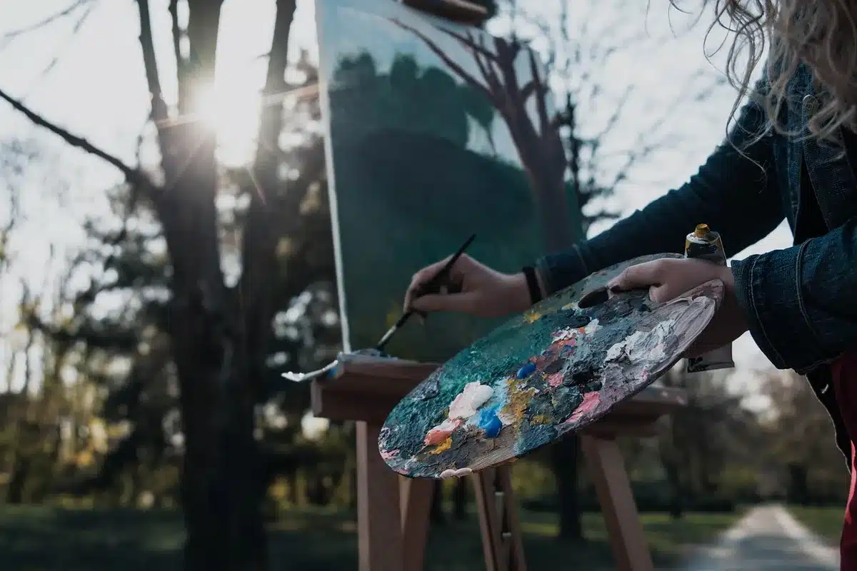 Artist filming an Instagram reel on set showing behind-the-scenes moments